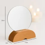 mini wooden stand and mirror on table